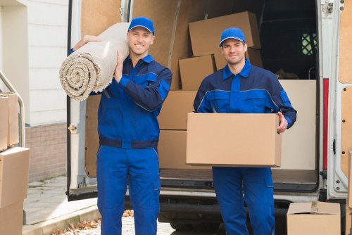Removal truck and packed boxes prepared for a Hatton relocation