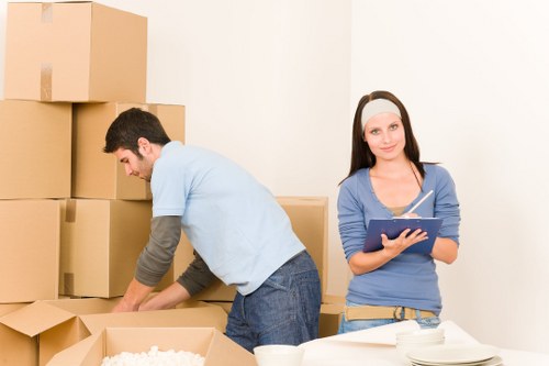 Man and van team unloading items at a Hatton property