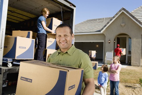 Packing and loading items into a moving van in Hatton