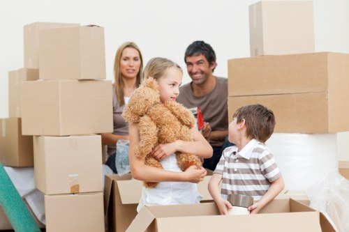 Packed office furniture and boxes ready for transport in Hatton