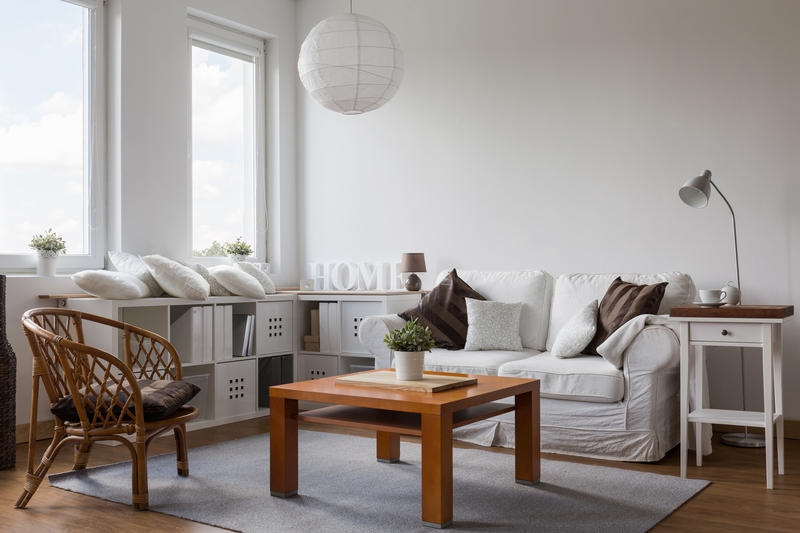 Professional movers handling boxed household items in Hatton
